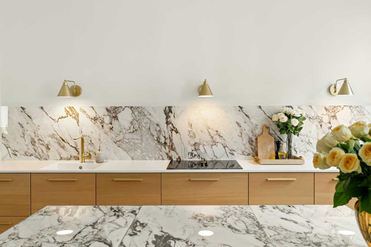 Updating Kitchens With Marble, Gold Accents, and Modern Appliances
